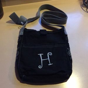 “31” black cloth crossbody bag.  H monogram.